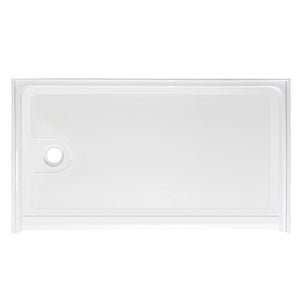 Top-down view of a rectangular, low-profile white shower base. The floor of the base has a subtle anti-slip texture pattern. There is a single circular drain hole located on the far left side. The base is surrounded by a low integrated lip or flange to contain water, viewed against a plain white background.