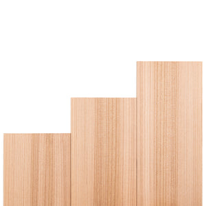 Three rectangular light-colored wood boards arranged side-by-side against a white background, positioned at staggered heights to resemble a step or staircase pattern while showcasing their uniform vertical grain lines.