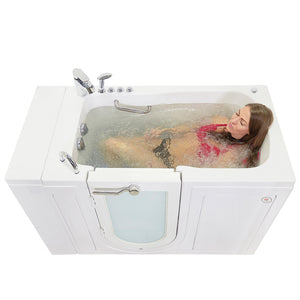 Ella Monaco 32"x52" Acrylic Air and Hydro Massage and Heated Seat Walk-In Bathtub with Left Outward Swing Door, 2 Piece Fast Fill Faucet, 2" Dual Drain, 2 stainless steel grab bars, 23” wide seat, Composite and tempered glass outward swing door with door seal and ANTI-leak 3 latch system with one woman model in a white background.