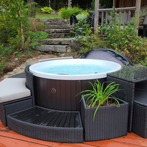 Canadian Spa Okanagan 4-Person 10-Jet Portable Hot Tub - White inside - Black outside - Size: 63 x 63 x 29 in - Filled with water - Outdoor setup - KH-10083 - Vital Hydrotherapy