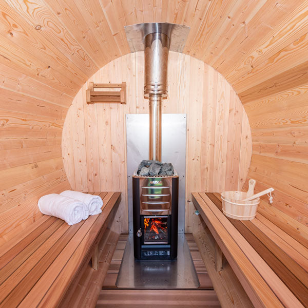 Harvia Sauna Stainless steel Chimney & Heat Shield Set for out the Top BSB214 - Inside setting - with solid benches, cedar bottle shelf, bucket & ladle, two white towels