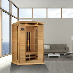 Maxxus Near Zero EMF FAR Infrared Sauna - 2 Person - Natural canadian hemlock wood construction with Tempered glass door and 2 full-length side windows, Interior reading light, Carbon Tech Low EMF FAR Infrared heaters , Roof vent, Interior LED control panel, FM Radio with BT, MP3 auxiliary, SD, and USB connection, Electrical service placed in a living room