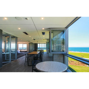 2300W Platinum Smart-Heat Electric Heater in Black Stainless Steel Tinted Glass-Ceramic Screen Slim-line Design mounted in ceiling of a cafeteria