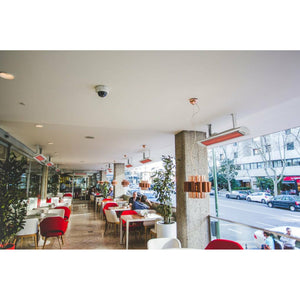 4000W Tungsten Smart-Heat Electric Patio Heater in White Stainless Steel, Black High Temperature Coating ceiling mounted in a restaurant