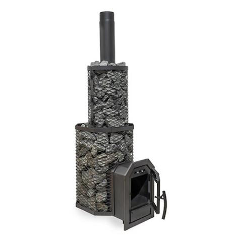 This multi-tiered Cozy Heat Thru-Wall wood-burning sauna stove is viewed from an alternate angle on a plain white background. The lower octagonal black wire mesh cage holds grey sauna stones and extends forward into a firebox tunnel for through-wall installation. The black cast-iron door with a glass window is swung wide open. Atop the main unit sits a smaller cylindrical mesh cage packed with stones and a matte black vertical exhaust pipe.