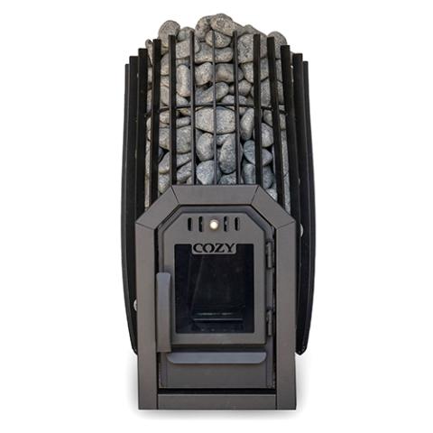 A front, straight-on view of a barrel-shaped black metal sauna stove against a white background. The stove features a tall outer cage of vertical metal slats tightly packed with rounded grey stones. At the bottom center, the dark grey firebox door features a square glass window with the embossed word 'COZY' on top. Framing the entire door assembly is a matching, chamfered black metal trim collar. The window is dark and unlit, showing an empty firebox interior.