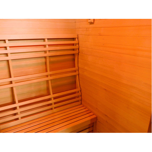 The interior of the sauna features warm wooden wall paneling, a slatted wooden bench, and a matching ergonomic slatted wooden backrest mounted against the wall.