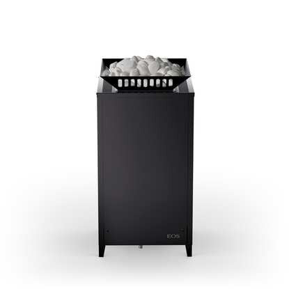 Black EOS sauna heater with angled stone tray filled with white sauna rocks on top, standing on four legs.