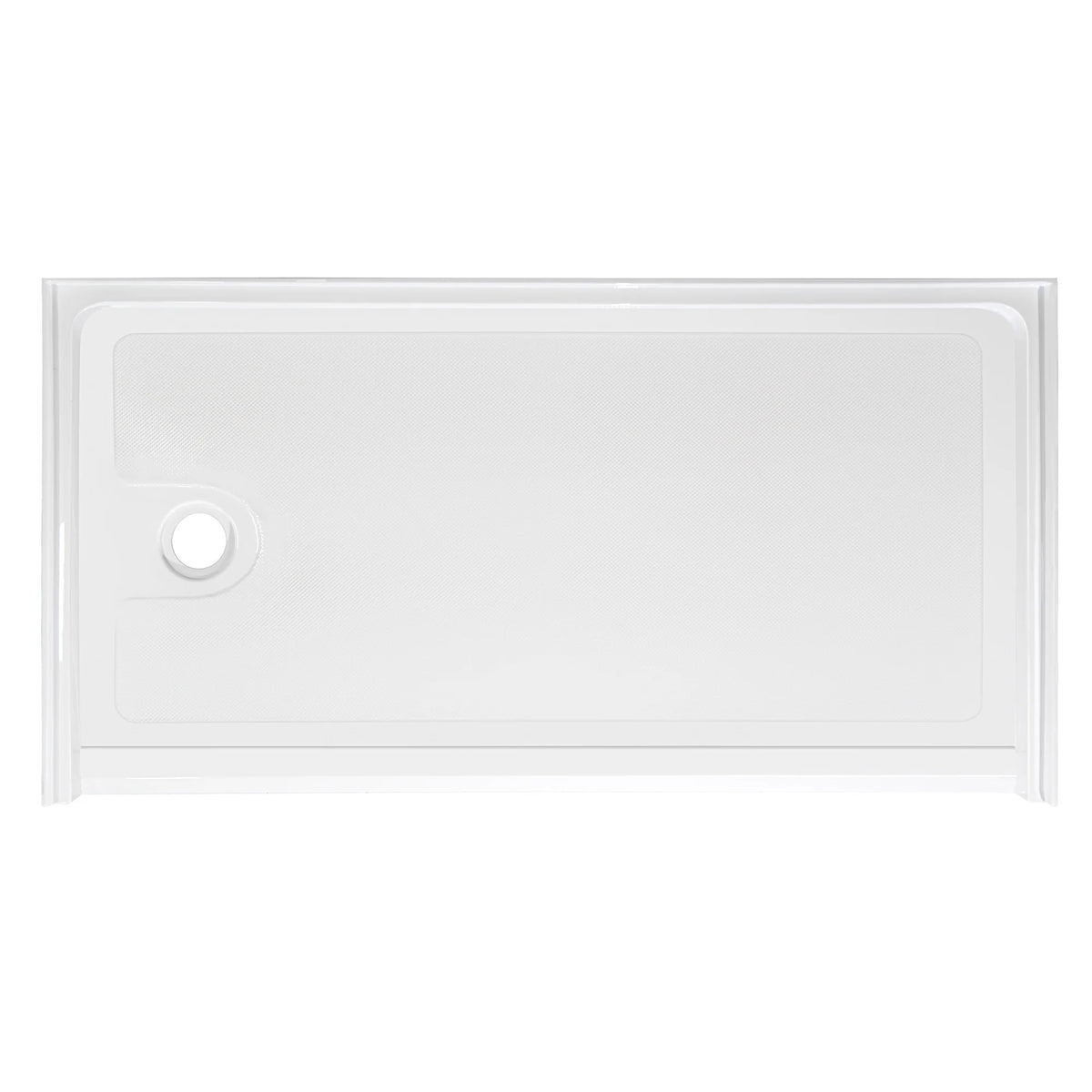 Top-down view of a rectangular, low-profile white shower base. The floor of the base has a subtle anti-slip texture pattern. There is a single circular drain hole located on the far left side. The base is surrounded by a low integrated lip or flange to contain water, viewed against a plain white background.
