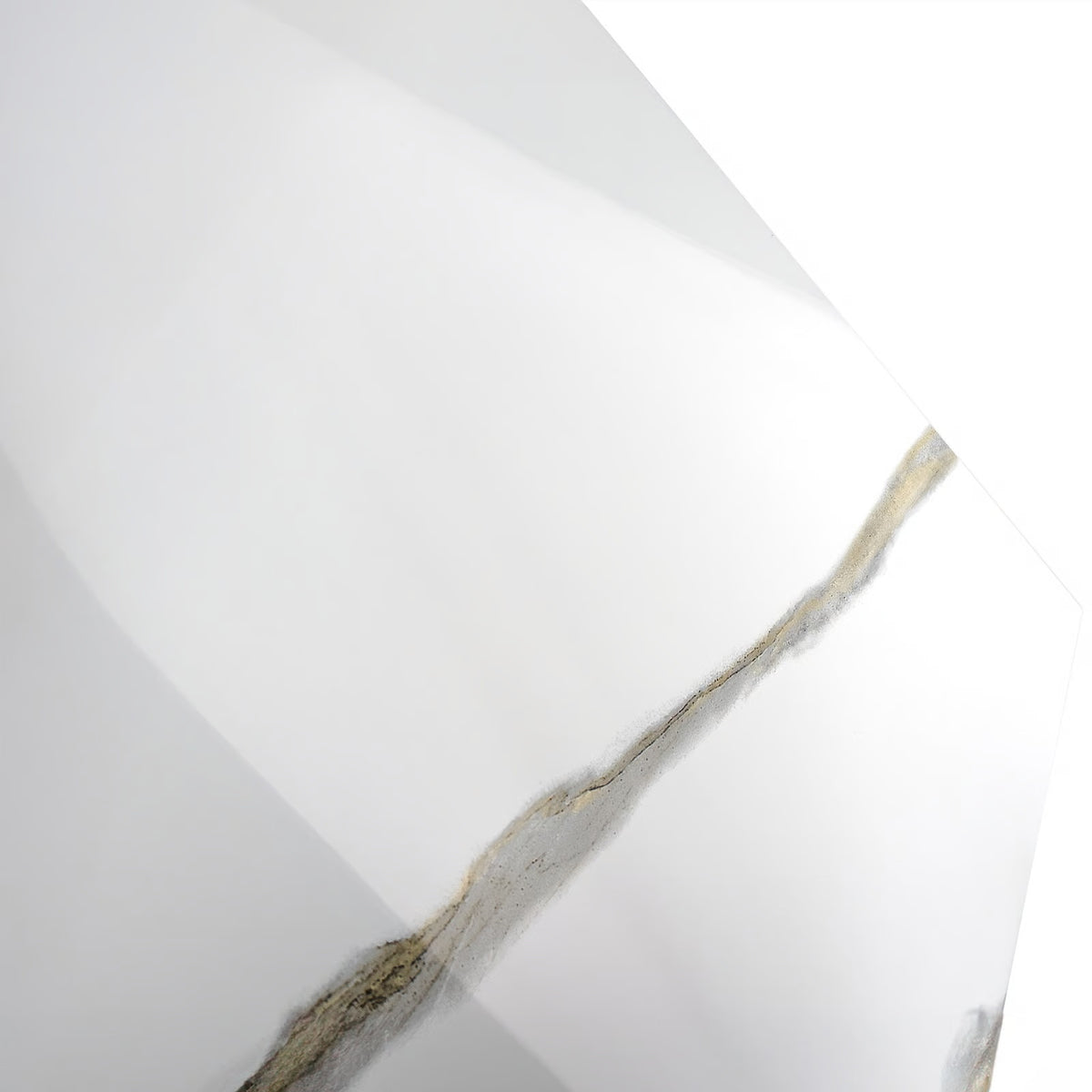 Close-up view of white-and-gold marble-pattern wall surround panel texture.