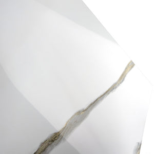 Close-up view of white-and-gold marble-pattern wall surround panel texture.