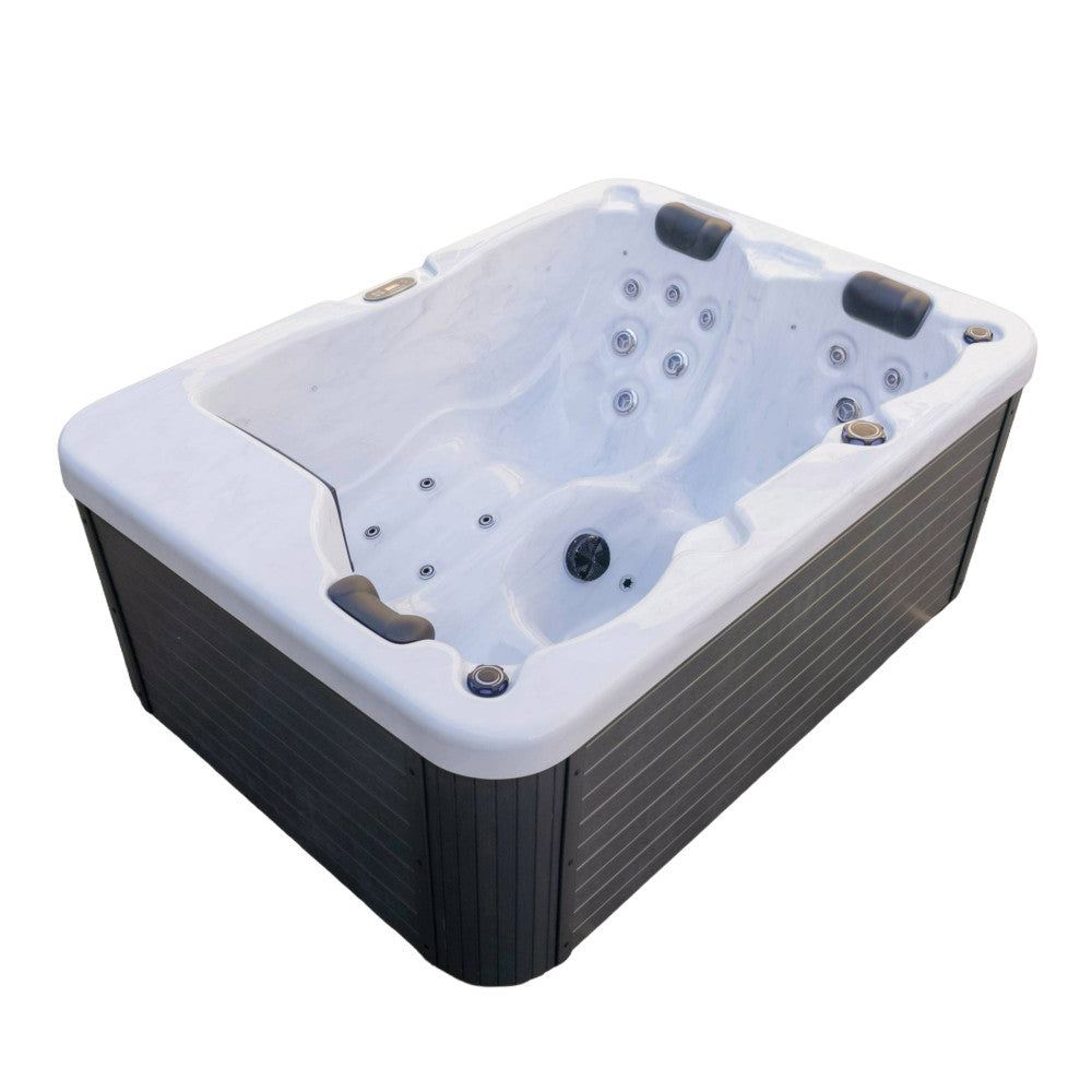 Three-person hot tub with white acrylic interior, two contoured seats each with headrest, multiple rows of massage jets, center control knob, and dark wood-textured cabinet panels.