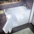 Meditub 29 x 53 White Wheelchair Accessible Bathtub - High-grade marine fiberglass with triple gel coating - White Finish and color matching trim - with 6.5 in. Threshold & 21 in. Seat Height, built-in grab bar - Left side drain - Outward swinging door - Air Jetted - Lifestyle - 2953 - Vital Hydrotherapy