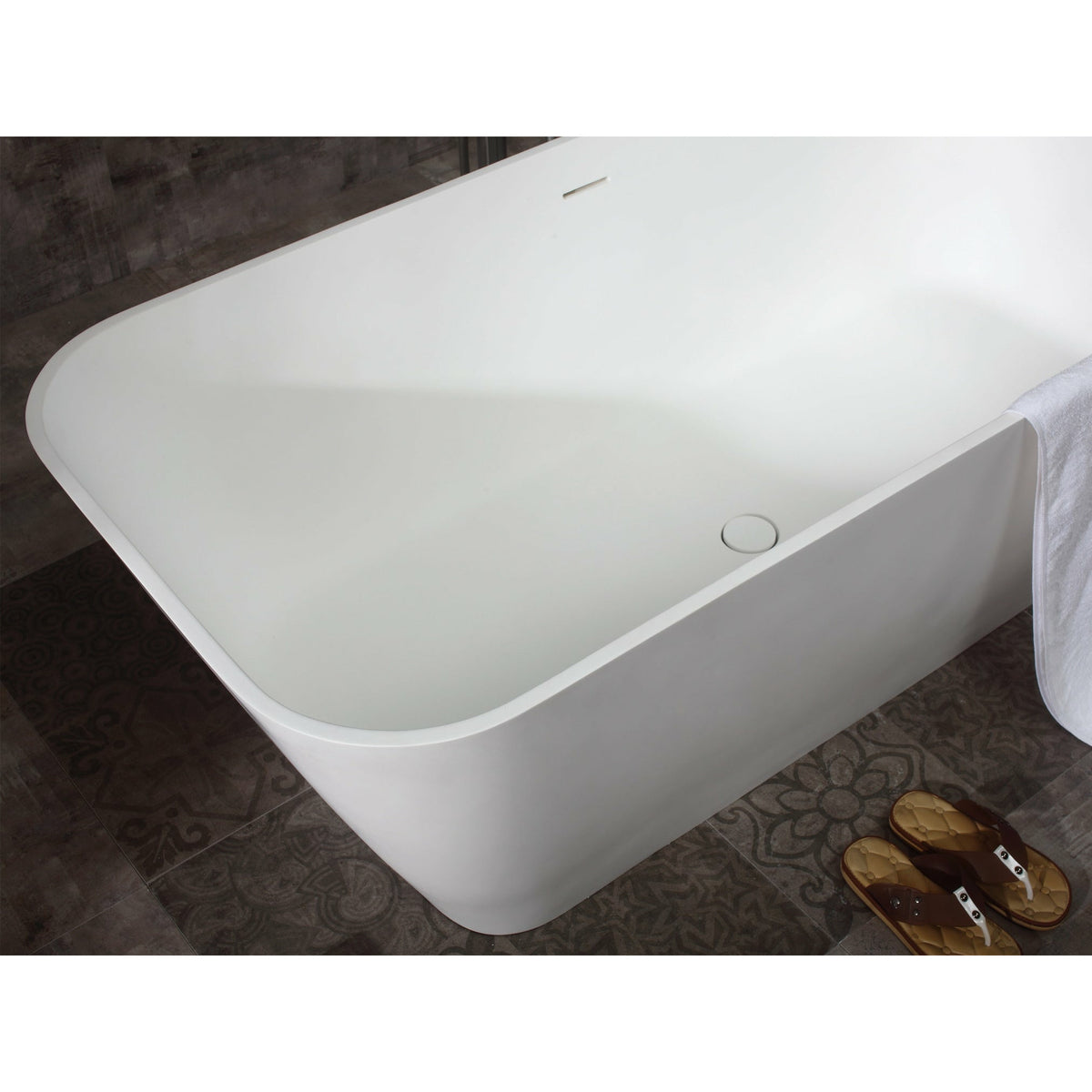 ALFI AB9952 67" White Rectangular Solid Surface Smooth Resin Soaking Bathtub with a matte finish with matte matching pop-up drain in the bathroom top view