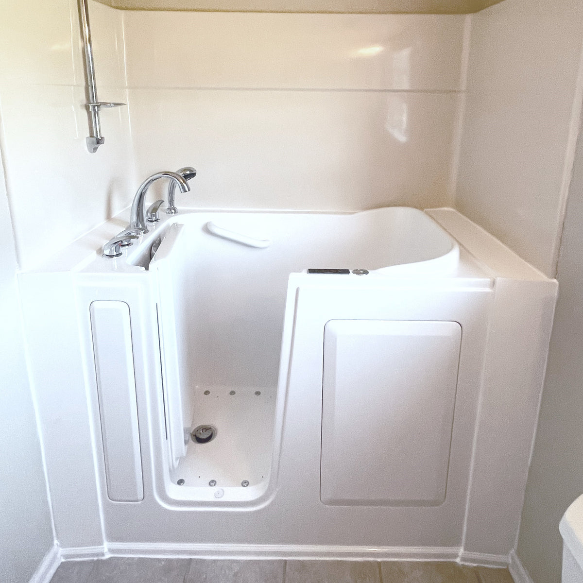 Avora Bath 28" x 48" walk-in tub white with contemporary faucet including hand shower - left inward swinging door - hydro and vibration jets with microbubbles - removable side access panels - highest grade fiberglass composite construction - gel coat high gloss finish - stainless steel frame - Vital Hydrotherapy