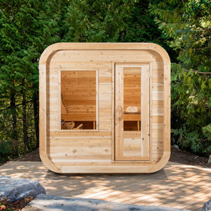 Dundalk Canadian Timber Luna 2 to 3 Person White Cedar Sauna CTC22LU - with bronze tempered glass with wooden frame - Front view - Outdoor setting - Vital Hydrotherapy