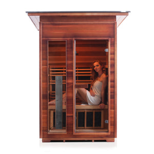 Enlighten Sauna Infrared/Traditional DIAMOND Outdoor Slope Roofed two person sauna Canadian Red Cedar Wood with glass door and window with young woman model front view