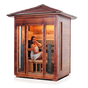 Enlighten Sauna Infrared/Traditional DIAMOND Outdoor peak Roofed three person sauna Canadian Red Cedar Wood with glass door and windows inside view with young woman model