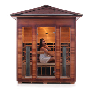 Enlighten sauna Infrared and Dry Traditional Hybrid Diamond 4 Person Outdoor Canadian natural red cedar wood Double Roof ( Flat Roof + peak roof) with glass door and windows with young woman model front view