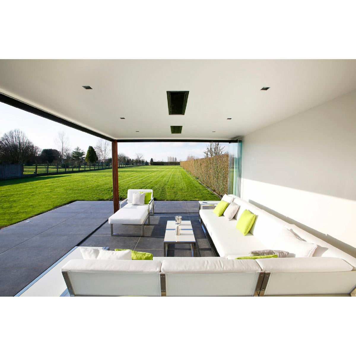 2300W Platinum Smart-Heat Electric Heater in Black Stainless Steel Tinted Glass-Ceramic Screen Slim-line Design mounted in ceiling of a dining set