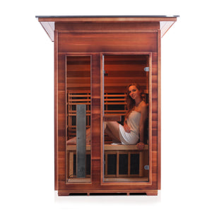 Rustic Infrared Sauna Canadian red cedar inside and out with slope roof and glass door and window with woman model inside front view