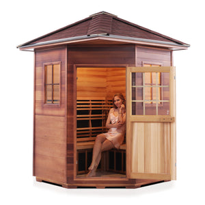 Enlighten Sauna InfraNature Original Infrared Outdoor Canadian red cedar inside and out with peak roof open door with woman model